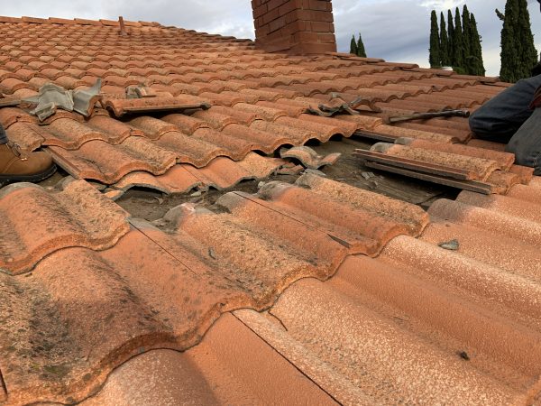 Tile roof opened up to the underlayment during a repair